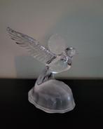 Glazen Vogel Sculptuur, Ophalen
