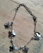 Zilverkleurige armband met vlinders, Overige materialen, Ophalen of Verzenden, Zo goed als nieuw, Met bedels of kralen