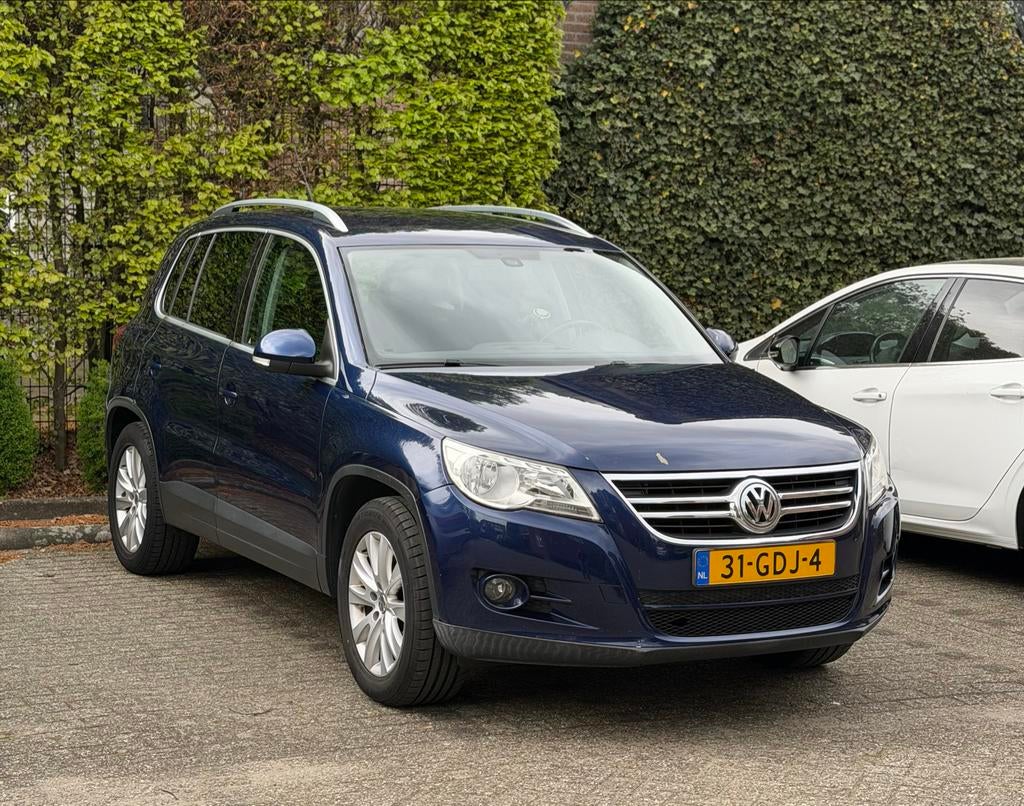 Nieuwe APK Volkswagen Tiguan 1.4 TSI 110KW 4MOTION 2008, Auto's, Volkswagen, Zwart, 4 cilinders, 2000 kg, Blauw