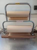 Houder voor papierrollen, Ophalen