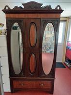 Antieke spiegelkast, Ophalen