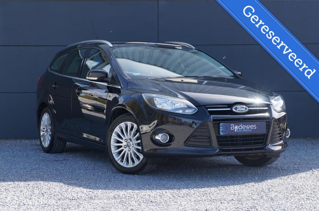 Ford Focus Wagon 1.6 TI-VCT Titanium met lage km stand, Auto's, Gebruikt, Zwart, 4 cilinders, Zwart