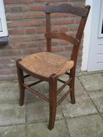 oude stoel gave biezen zitting, Ophalen