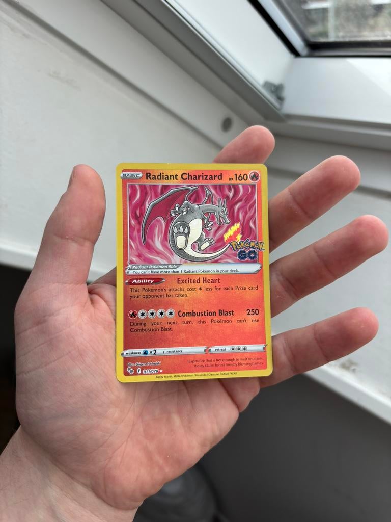 Radiant Charizard 011/078, Ophalen of Verzenden, Zo goed als nieuw