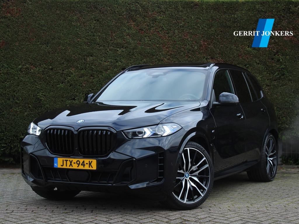 BMW X5 xDrive50e Launch Edition | Skylounche (bj 2023), Gebruikt, 2395 kg, Blauw, Leder