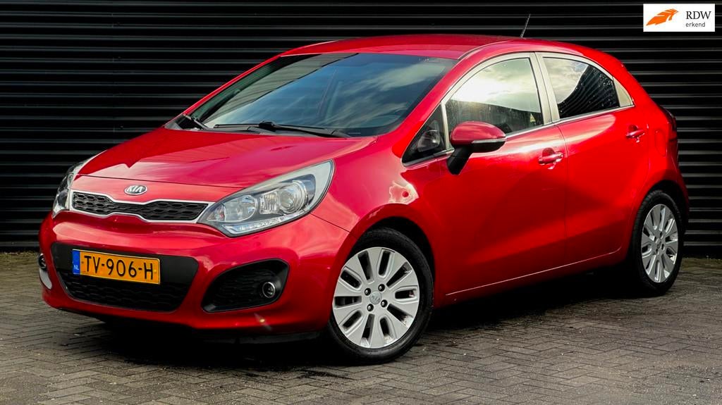 Kia Rio 1.4 CVVT Super Pack | Automaat | Cruise | Bluetooth, Auto's, Kia, Euro 5, Gebruikt, Zwart, 4 cilinders