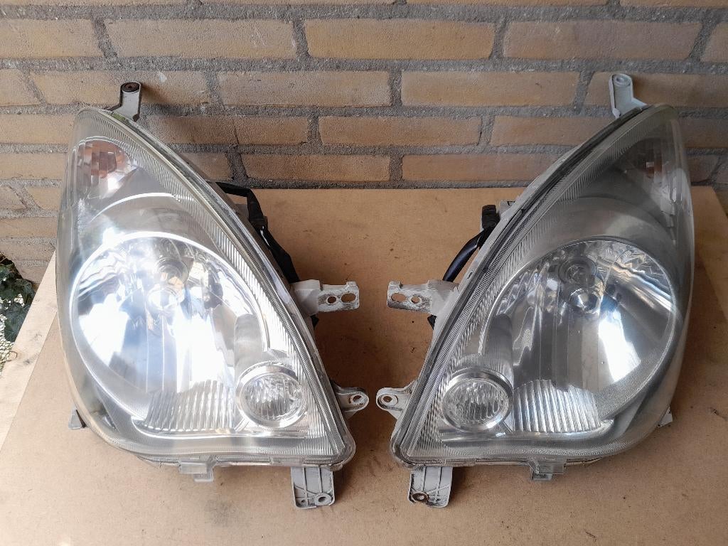 KOPLAMP L+R - DAIHATSU CUORE L251/271/276 - €32,50 per stuk, Verzenden, Gebruikt, Daihatsu
