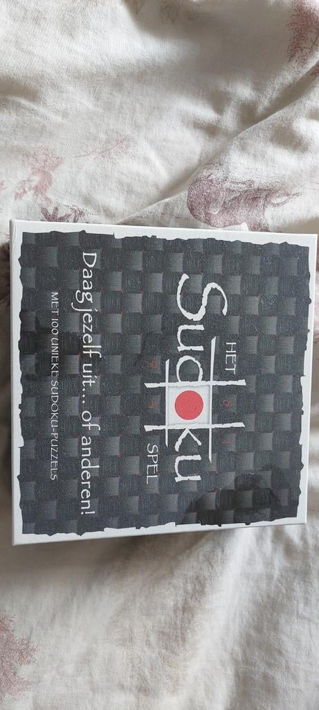 Het Sudoku Spel met 100 unieke puzzels, Hobby en Vrije tijd, Ophalen of Verzenden, Zo goed als nieuw, Puzzelboek