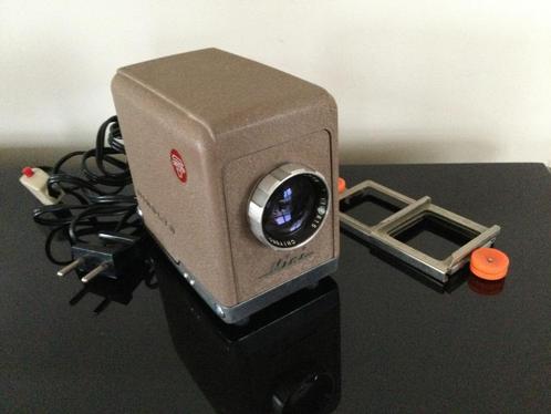 Vintage Minolta Mini Chiyoko diaprojector in originele hoes, Verzamelen, Retro, Huis en Inrichting, Verzenden