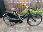Ouderwetse fiets met kruisframe, Ophalen