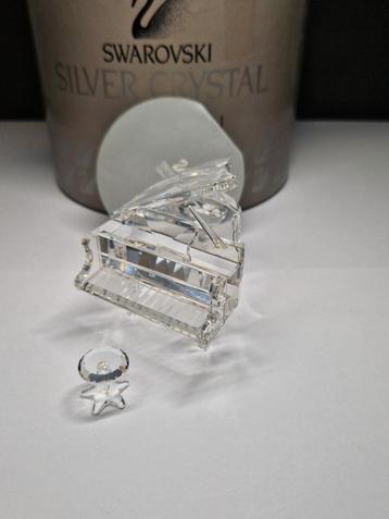 Swarovski Beeldje Vleugel met kruk Kristal (piano) beschikbaar voor biedingen