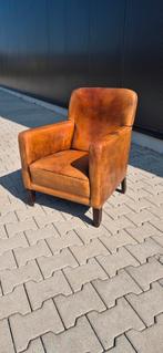 Schapenleren fauteuil, Ophalen