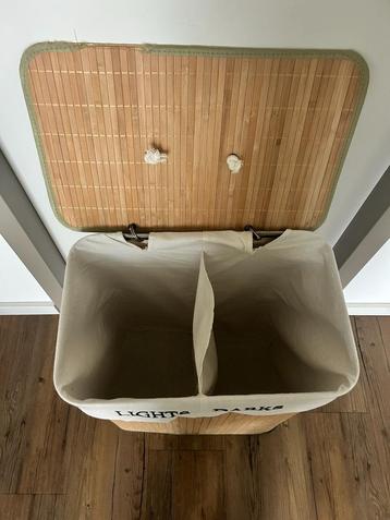 Wasmand met 2 vakken beschikbaar voor biedingen