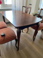 Uitschuifbare Houten Eettafel, Ophalen