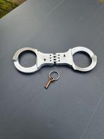 Lips handboeien met sleutel., Verzamelen, Ophalen of Verzenden