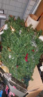 Kunst kerstboom met lichtjes er in, Ophalen