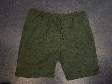 Nieuw groen gemeleerd kort broekje mt XL beschikbaar voor biedingen