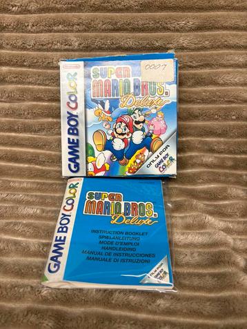 Super Mario Bros. Deluxe – Doos en handleiding zonder spel ( beschikbaar voor biedingen