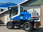 Caterpillar M315 (bj 2000), Graafmachine