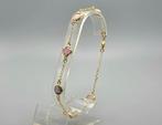 Goud op zilver armband met edelstenen. 2025/506.