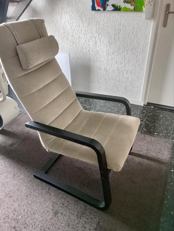 Fauteuil, houten frame en stoffen bekleding.