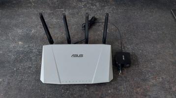 Te koop ASUS router RT AC87U  met adapter.