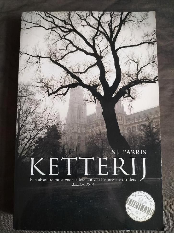 S.J. Parris - Ketterij, Boeken, Thrillers, Zo goed als nieuw, Ophalen of Verzenden