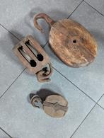 3 antieke katrollen, Ophalen