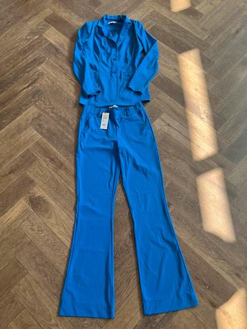 Pak travelstof Nicolette Kluijver broek medium blazer small beschikbaar voor biedingen