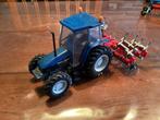 Britains New Holland tractor, Hobby en Vrije tijd, Modelauto's | 1:32, Ophalen of Verzenden, Gebruikt, Tractor of Landbouw, Britains