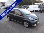 Toyota Aygo 1.0 VVT-i Dynamic Orange (bj 2012), Auto's, Toyota, Voorwielaandrijving, Euro 5, Stof, Gebruikt
