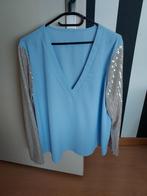 Blauwe blouse met pailletten mouwen - Maat l, Kleding | Dames, Blouses en Tunieken, Blauw, Maat 42/44 (L), Ophalen of Verzenden