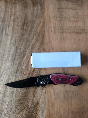 Zakmes met riem clip (2) beschikbaar voor biedingen