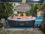 Nette jacuzzi met ombouw, Tuin en Terras, Ophalen of Verzenden
