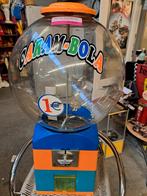 Capsule automaat Caram-Bola, Ophalen