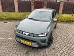 Dacia Spring Extreme 65 26.8 kWh NIEUWSTAAT NAVI AIRCO CRUIS, Stof, Gebruikt, 4 stoelen, Origineel Nederlands