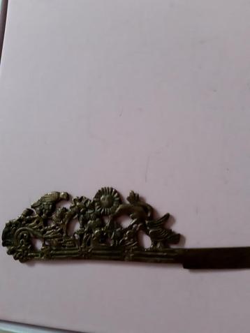 Antieke briefopener met vogelmotief beschikbaar voor biedingen