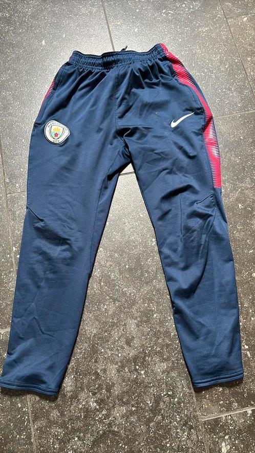 Nette traningsbroek Manchester City, nike maat m, Kinderen en Baby's, Kinderkleding | Maat 140, Zo goed als nieuw, Jongen of Meisje