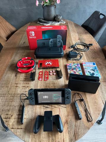 Nintendo Switch Gen 2 grijs + Mario Kart 8 Deluxe + Monopoly beschikbaar voor biedingen