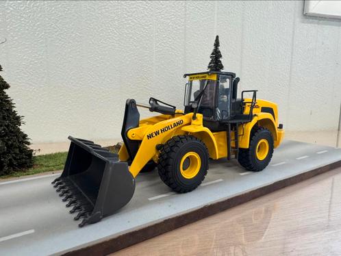 Motorart new holland w300c shovel, Hobby en Vrije tijd, Modelauto's | 1:50, Zo goed als nieuw, Hijskraan, Tractor of Landbouw