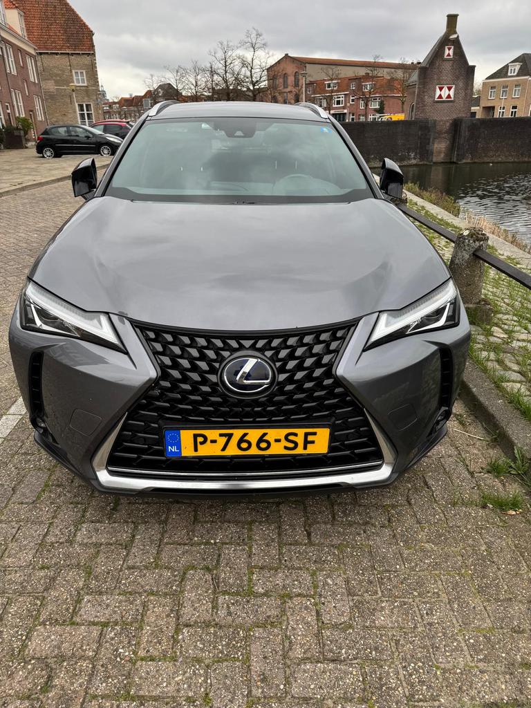 Lexus UX 250h Hybrid 184pk CVT 2021 Grijs, Auto's, USB, 750 kg, Alcantara, 1987 cc