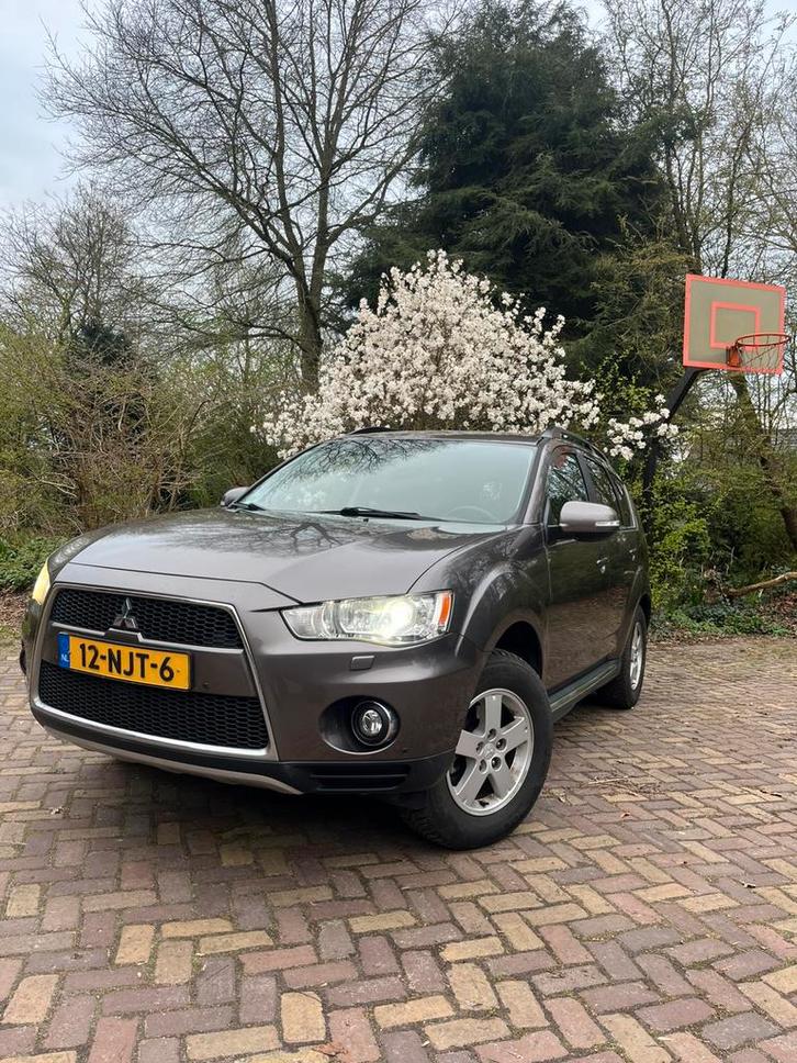 Mitsubishi Outlander 2.4 4X4 FULL OPTION 1e EIGNR 2010, Auto's, Mitsubishi, Particulier, Outlander, 4x4, Achteruitrijcamera, Airconditioning