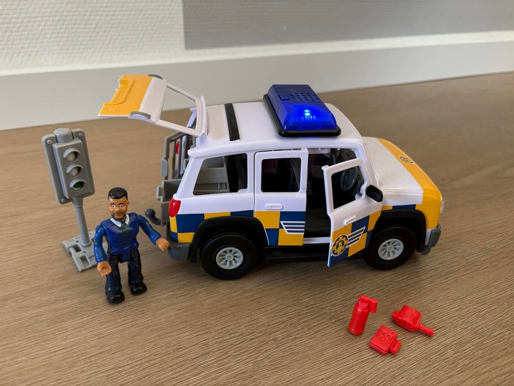 Brandweerman Sam Politieauto met Malcolm, Kinderen en Baby's, Speelgoed | Speelgoedvoertuigen, Gebruikt, Ophalen of Verzenden