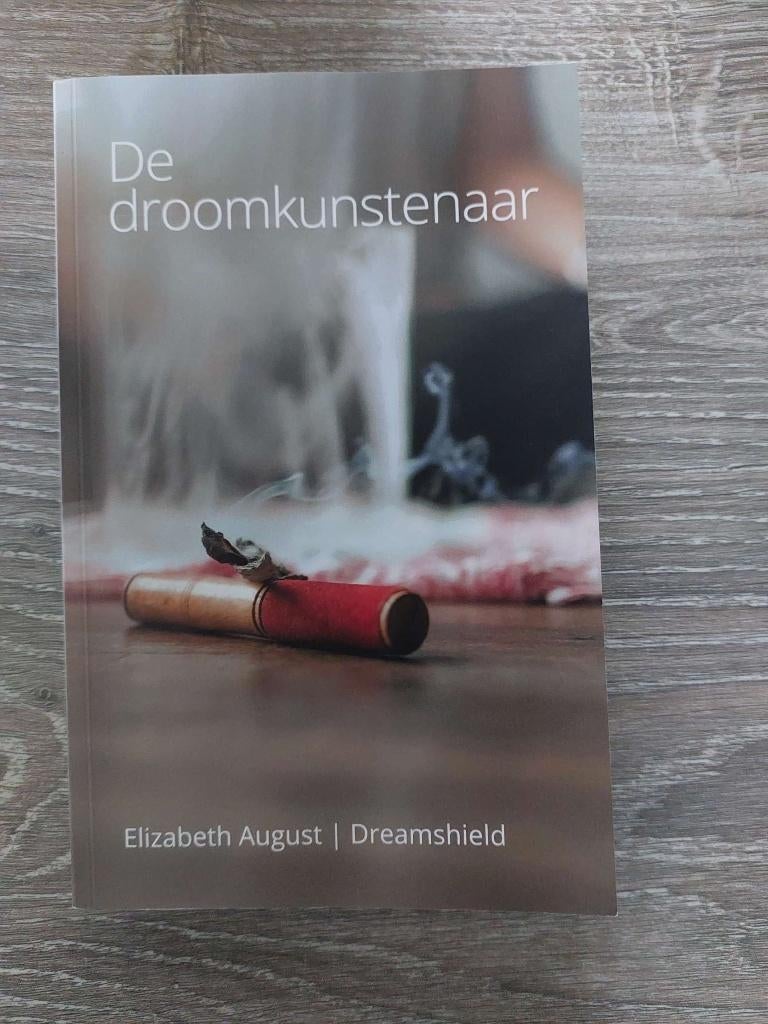 Elizabeth August - Dreamshield - De droomkunstenaar - 2021, Ophalen of Verzenden, Zo goed als nieuw, Overige onderwerpen, Verhaal of Roman