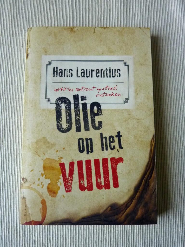 Olie op het vuur, Hans Laurentius, Achtergrond en Informatie, Ophalen of Verzenden, Zo goed als nieuw, Overige onderwerpen