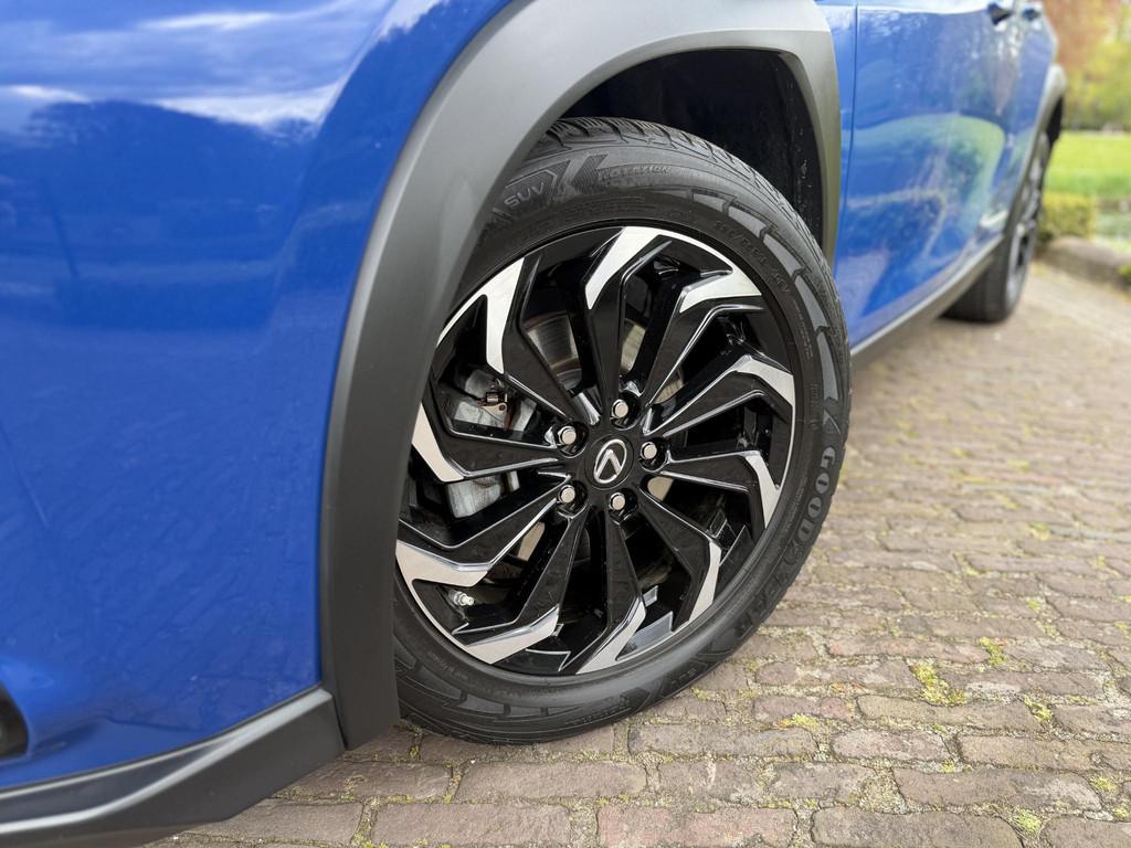 Lexus UX 300e Business 54 kWh | Led | Nieuwe Service & Garan, Auto's, Stof, Gebruikt, Zwart, Blauw