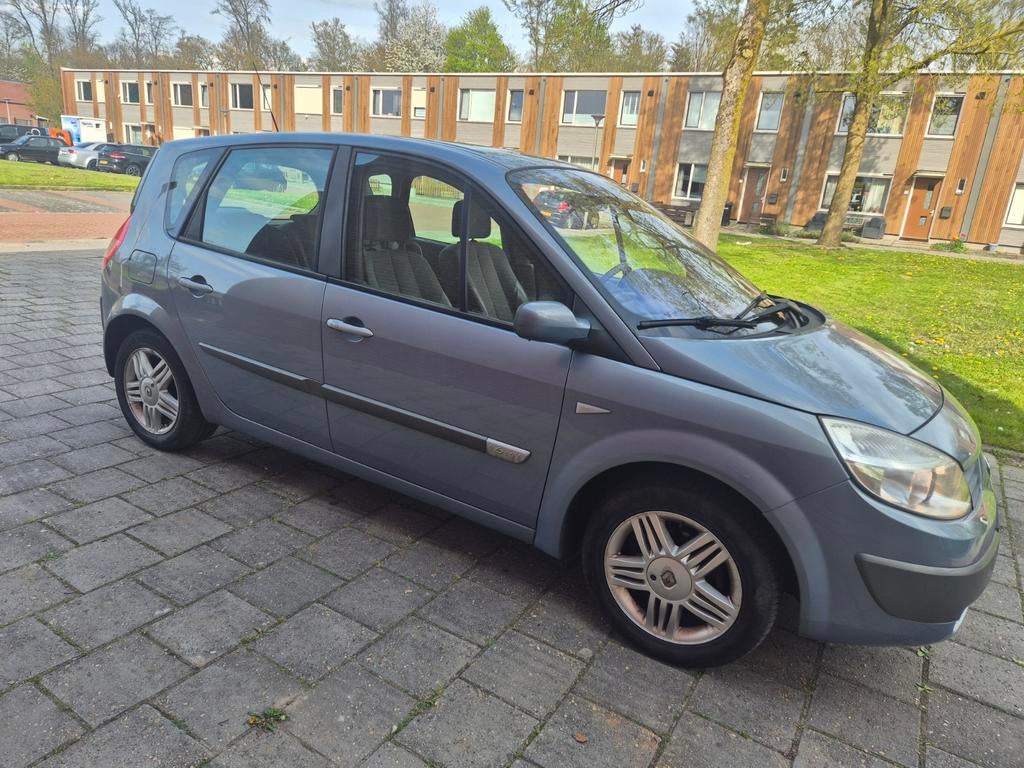 Renault Scénic 1.6 16V 83KW Autbas Euro3 2004 Blauw, Auto's, Renault, Voorwielaandrijving, 4 cilinders, Blauw, Leder en Stof