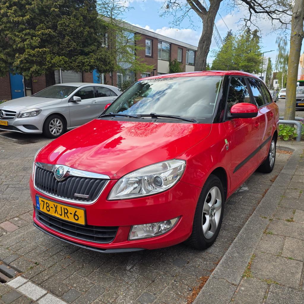 Skoda Fabia 1.2 TDI 55KW Greenline Combi 2012 Rood, Auto's, Voorwielaandrijving, Euro 5, 1199 cc, Automatische klimaatregeling