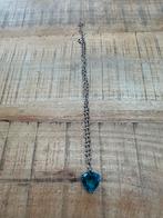 Luxenter Zilverkleurige ketting met hartvormige hanger, Overige materialen, Blauw, Ophalen of Verzenden, Zo goed als nieuw