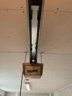 Novoferm Novomatic 440 garagedeuropener met 2 afstandsbed., Ophalen, Gebruikt, Garagedeur, 120 cm of meer